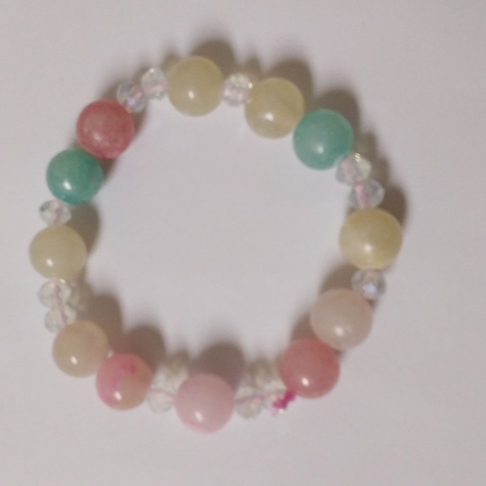 Pink, green, yellow, and white homemade bracelet💗💛